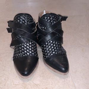 Black backless booties with buckles